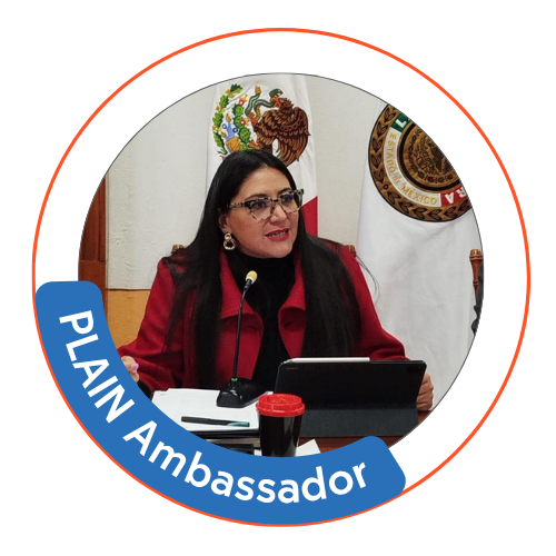 Claudia Hernández Flores with badge