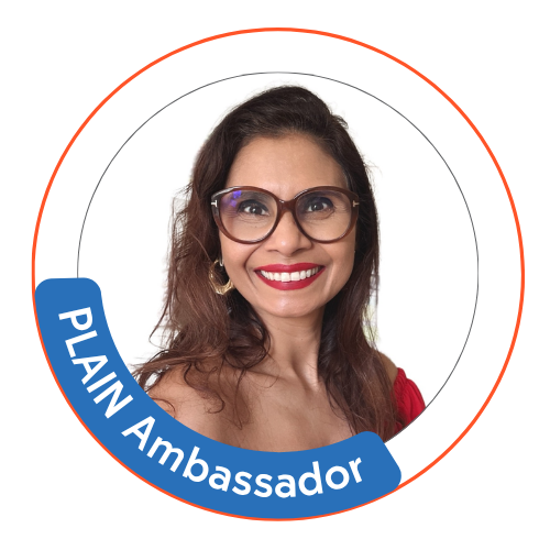 Maria Auxiliadora Paula de Paiva with badge